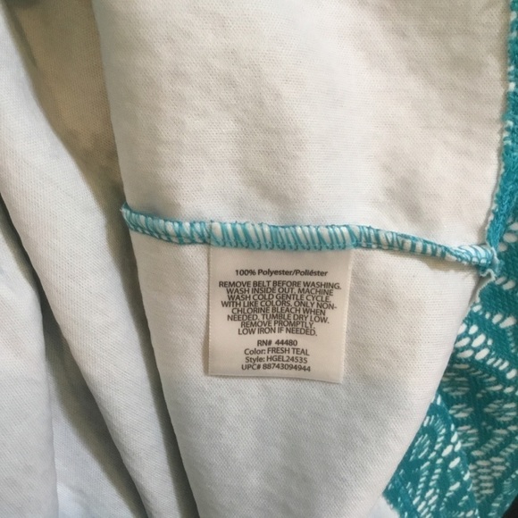 George teal and white belted sleevesless dress
Woman’s size XL 16-18 - Picture 10 of 16